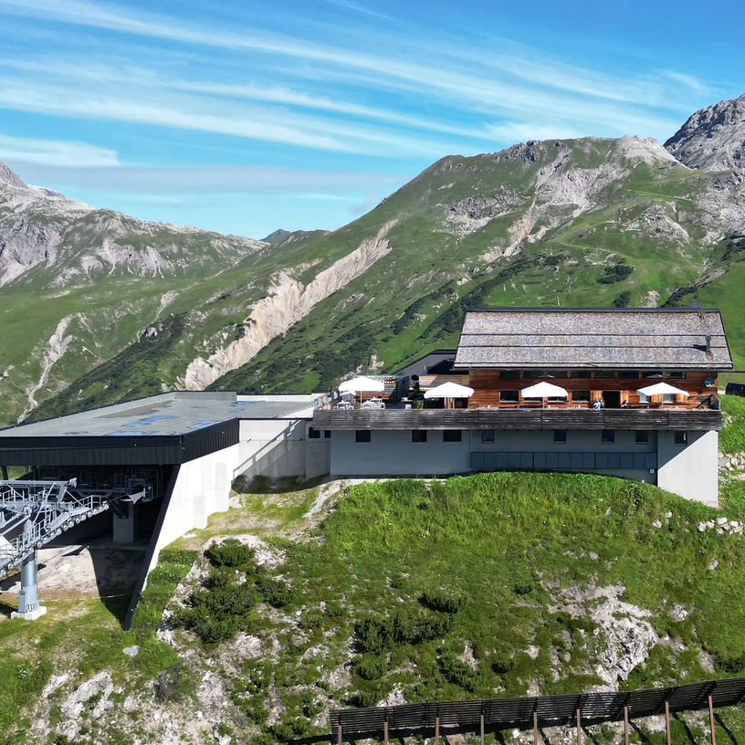 Hut and cable car station on Kriegerhorn family mountain in the Alps.