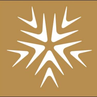 Weißes, sternförmiges Muster auf goldenem Hintergrund.