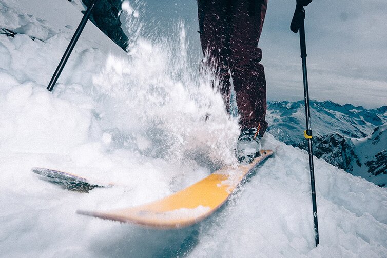Close-up of skier on a snowy slope.