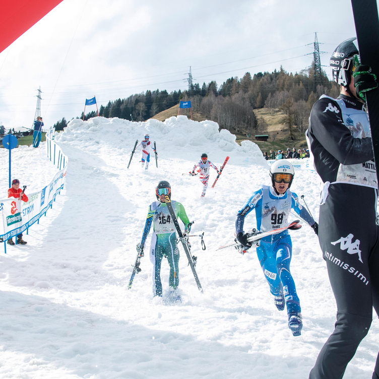Skiers starting a race in the ski region of St. Anton am Arlberg.